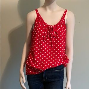 Fun red with white polka dot Charming Charlie top.